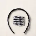 Detalle de la diadema de cuentas expandible con dimensiones en estado estirado y normal - Negro