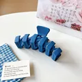 Matte Klein blue large hair claw clip in geometric design for thick hair styling - Dark Blue Ripple