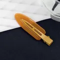 Fermaglio per capelli in acrilico ambrato effetto gelatina con finitura opaca - Marrone