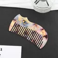 Cat-shaped acetate hair comb with purple pink iridescent texture and gold cat face details - Multicolor