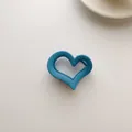 Minimalist matte Klein blue heart hair claw clip with cutout design and non-slip grip - Light Blue Heart