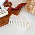 Cat shaped white marble acetate hair comb with golden facial details and wide teeth - Pearl White