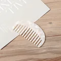 Elegant semi-circular cream white cellulose acetate wide-tooth hair comb with marble texture - Gem White