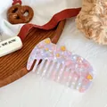 Pink and blue marble acetate wide-tooth cat-shaped hair comb with gold cat ear details - Floral Pink