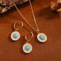Elegante vintage gouden sieradenset met turquoise ovale hangers en fonkelende stenen. - Saffier Sieradenset (T073) / Goud