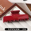 Rectangular deep red acetate hair claw clip with gold Barrette La France lettering - Burgundy