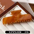 Minimalist amber tortoise shell rectangular hair claw clip with French lettering finish - Caramel color