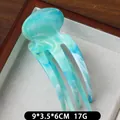 Haarklem met marmerpatroon in meergron en wit, afmetingen 9x3.5x6CM stijlvol - Cyaan