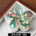 Pince à cheveux fleur avec motifs de Noël, pain d'épice et carreaux, 8x4,5cm - Ours en peluche