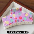 Purple Christmas hair claw clip with colorful holiday prints of trees and gifts - Christmas Tree