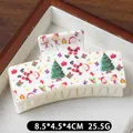 Creamy white Christmas hair claw clip with festive Santa and reindeer patterns - White Base Santa and Gift