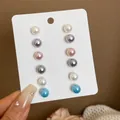 Set of six pairs of colorful round pearl stud earrings on a white professional card - Colorful Pearls (30# Silver Earring Post)
