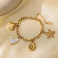 Bracelet en acier inoxydable doré 18k avec pendentifs étoile de mer, coquillage et cœur - Bracelet Océan Coeur en Nacre Blanche Artificielle (E2199) / Or