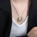 Silver sunflower pendant necklace in stainless steel with sunburst spike charm for women - 43+5cm / Silver