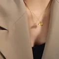 Elegant gold titanium steel necklace featuring dual lotus pod pendants on a thin chain - Lotus Pod Necklace (P1030-Gold Necklace-40+5cm) / Gold