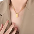 Gold rectangular pendant necklace with embossed letter S on a stylish fashion model - Letter S Style (P1506-S)