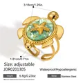 Detalles del anillo de tortuga marina dorada con estrella de mar e incrustación verde. - Anillo Ajustable en Forma de Tortuga (JDR0201305)