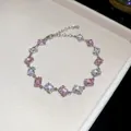 Detalle de una pulsera de circonitas rosas y blancas con elegantes piedras rectangulares - Estilo 46# Plateado Rosa y Blanco