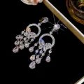 Elegantes pendientes de plata de lujo con mariposas de circón y borlas de gotas de agua - Plata-Blanco-Pendientes de clip