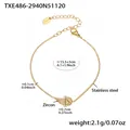 Detail of wing-shaped zircon bracelet with measurements and gold-plated stainless steel texture - Gold Bracelet