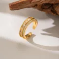Macro view of micro-paved clear zircon stones on gold-plated open ring band. - Double Row Zirconia (F1170)