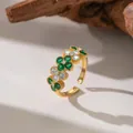 Detailed view of micro-paved green and white zircon flowers on a gold open ring - White Green Zirconia Flower (F1243)