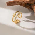 Detailed view of gold open ring with star charm and micro-paved cubic zirconia - Double Layer Star (F1270)