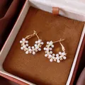 Macro view of elegant gold hoop earrings with white pearls and zircons in a velvet box - Pearl Rhinestone Hoop Style (43#)