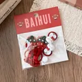 Dettaglio del set di elastici per capelli con fiocchi rossi, fragole e conigli - Stile Coniglietto con Fragola