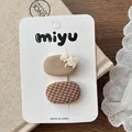 Detail von Baby-Haarspangen mit Spitzenbogen und Karomuster auf Displaykarte - 1-Beige-Kaffee Gruppe