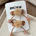 Lot de deux barrettes à cheveux marron avec pompons doux pour filles sur carte cadeau - Marron