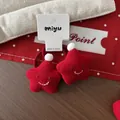 Paio di elastici per capelli a stella rossi in maglia con pompon bianchi e ricamo - Elastico per Capelli Stella