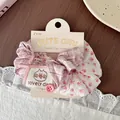 Detail of pink plaid and floral scrunchie with lovely day tag on a display card - Pink Floral