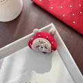 Close-up of cute plush red bear hair accessory with gold beads and embroidery - Red Beaded Bear Style / Hair Clip