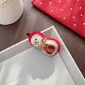 Plush red and white gourd accessory with gold Fu embroidery and silk cord detail - Fu Doll Style / Hair Clip