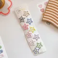Lot de 10 barrettes en forme d'étoile aux couleurs macaron présentées sur une carte blanche - Pentagramme / Multi-couleurs Macaron