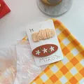 Set di fermagli per capelli con ricamo floreale e tessuto plissettato arancione - Champagne