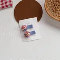 Set de pinzas para el pelo con flores para niñas con cintas moradas en cartulina - Pequeño / Azul