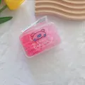 Pink high-elastic hair ties in a cute cartoon box on a stylish decorative setting - Gradient Pink