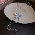 Collier papillon argenté avec pendentif en cristal sur assiette en céramique - Style Cœur Libellule Argenté