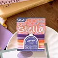 Detailansicht von fünf farbigen nahtlosen elastischen Haarbändern auf weißem Teller - 5 Stück / Lila-Orange