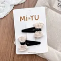 Close-up of black velvet hair clips with beige lace bows on a white card - Small Lace Bowknot Style