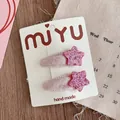 Close-up of sparkling pink sequin star hair clips on handmade card packaging - Velvet Wrapped BB Clip / Rose Red Star