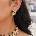 Detail view of gold-tone vintage earrings and necklace with green resin stones - Earrings Only (Earring Post Style) / Green
