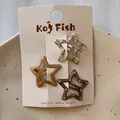 Three-piece set of star-shaped hair clips in brown tones on branded card packaging - Dark Coffee Polka Dot Series