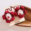 Detalle de pinzas para el cabello de felpa roja con pompones blancos y figuras de conejo - Estilo de Flor