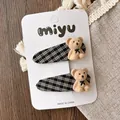 Detail of cute flocked teddy bear hair clips with black and white plaid fabric on metal base - Full Body Bear / Hair Clip