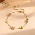 Detail of stainless steel bracelet with hollow heart charms and pink rectangle gems. - Hollow Heart Pink Rhinestone Style (L713)