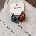Cartoon bear and blue flower hair ties with durable red elastic bands on card - Flower Bear