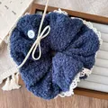 Dark blue plush scrunchie with teddy fleece texture and white lace trim detail - Navy Blue